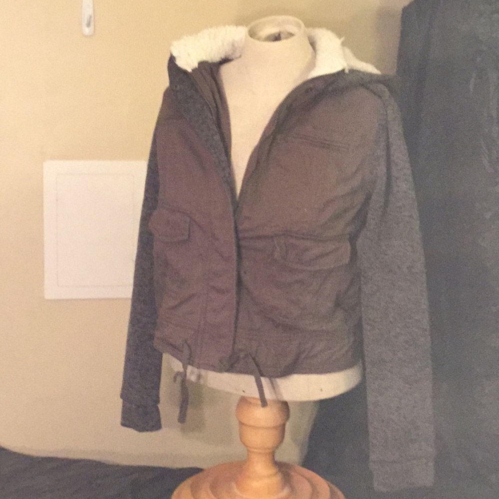 A gray and green jean jacket